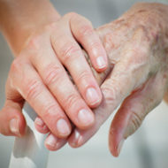 holding hands old couple